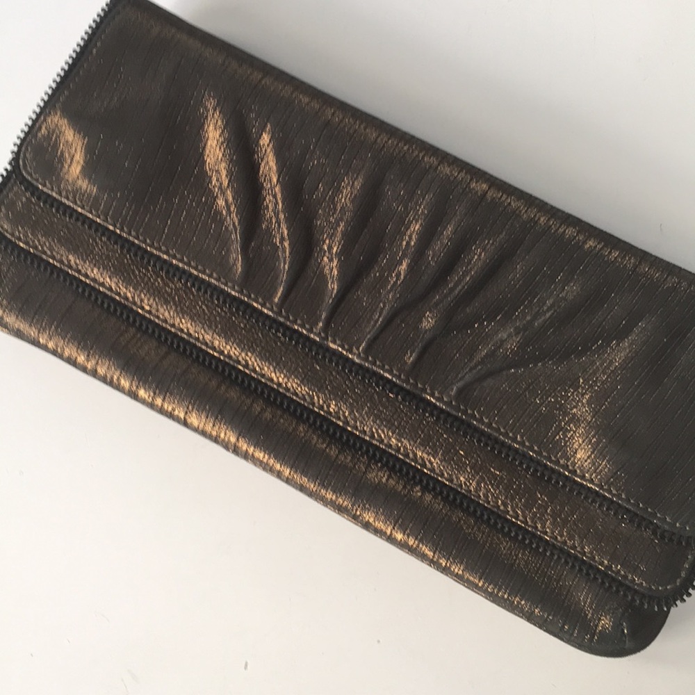 NWOT Lauren Merkin clutch metallic bronze with zipper detail